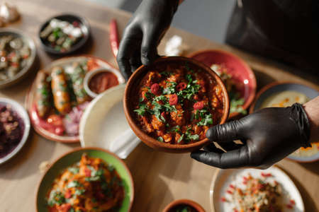 Close-up of different dishes on the plates.の写真素材