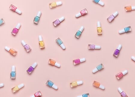 Nail polish pattern. Pastel colors. Pink background. Top viewの写真素材