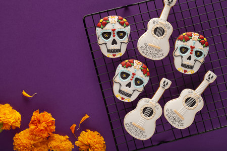 Cookies for the day of the death. Dia de los Muertos. Cookies in the form of a skull and a guitarの写真素材