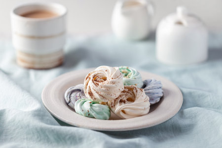 Close up of delicious meringues on the table.の写真素材