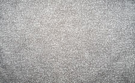 Light gray background with white specks. Background from gray matterの写真素材