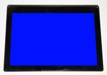 Large black tablet on a white background with a blue screen