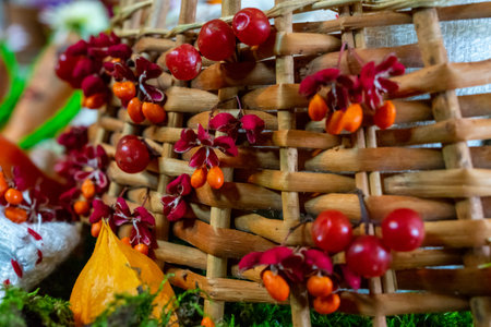 Red viburnum berries on a decorative fence