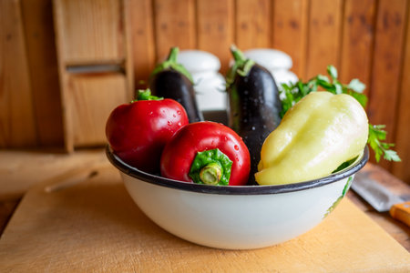 Big ripe vegetables in a white bowlの写真素材