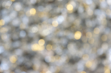 A soft, blurred background with shimmering highlights creates a calm and soothing ambiance suitable for artistic projects.の写真素材