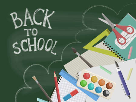 Back to school design layout with green chalkboard and various accessoriesの写真素材
