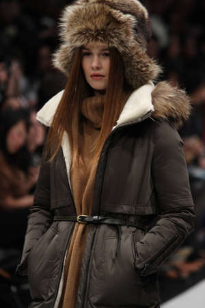 TORONTO - MARCH 13: A model walks the runway in the Soia & Kyo runway show for the Fall/Winter 2012 season at Toronto's World Mastercard Fashion Week on March 13th 2012.のeditorial素材