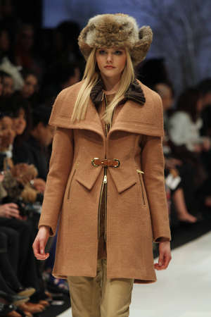 TORONTO - MARCH 13: A model walks the runway in the Soia & Kyo runway show for the Fall/Winter 2012 season at Toronto's World Mastercard Fashion Week on March 13th 2012.のeditorial素材