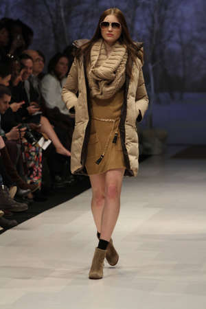 TORONTO - MARCH 13: A model walks the runway in the Soia & Kyo runway show for the Fall/Winter 2012 season at Toronto's World Mastercard Fashion Week on March 13th 2012.のeditorial素材