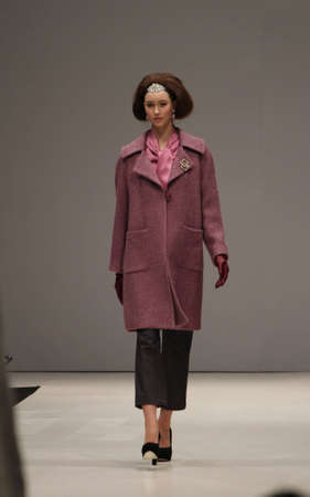 TORONTO - MARCH 13: A model walks the runway in the Lundstrom Collection runway show for the Fall/Winter 2012 season at Toronto's World Mastercard Fashion Week on March 13th 2012.のeditorial素材