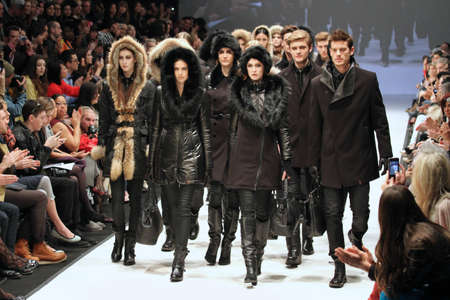 TORONTO - MARCH 15: Models walk the runway in the Rudsak runway show for the Fall/Winter 2012 season at Toronto's World Mastercard Fashion Week on March 15th 2012.のeditorial素材