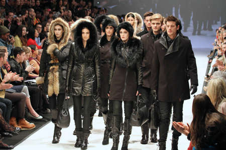 TORONTO - MARCH 15: Models walk the runway in the Rudsak runway show for the Fall/Winter 2012 season at Toronto's World Mastercard Fashion Week on March 15th 2012.のeditorial素材