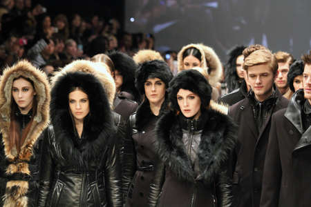 TORONTO - MARCH 15: Models walk the runway in the Rudsak runway show for the Fall/Winter 2012 season at Toronto's World Mastercard Fashion Week on March 15th 2012.のeditorial素材