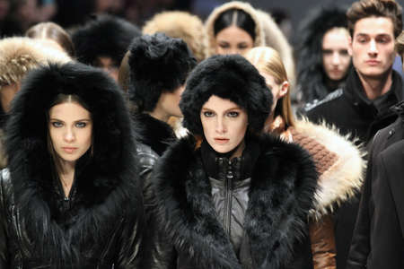 TORONTO - MARCH 15: Models walk the runway in the Rudsak runway show for the Fall/Winter 2012 season at Toronto's World Mastercard Fashion Week on March 15th 2012.のeditorial素材