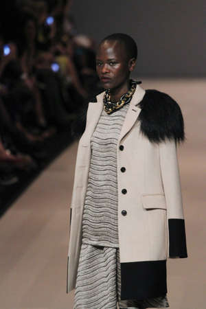 TORONTO - MARCH 15: A model walks the runway in the Pink Tartan runway show for the Fall/Winter 2012 season at Toronto's World Mastercard Fashion Week on March 15th 2012.のeditorial素材