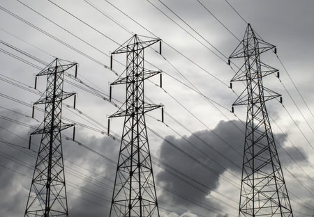  Power lines backed by a stormy sky 