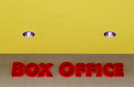 A large box office sign alerting movie goers were to buy ticketsの写真素材