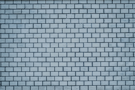 An old pale blue brick wall texture for  backgroundの写真素材