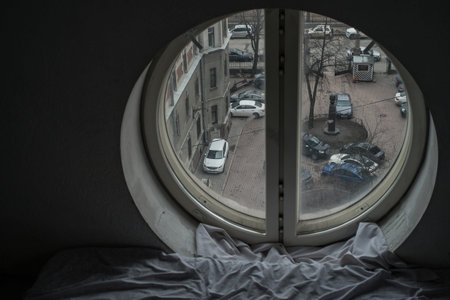 Urban view from the round window in  Saint-Petersburg