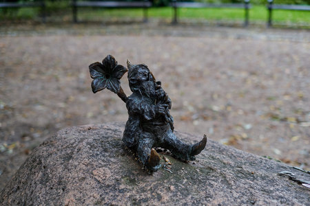 Miniature dwarf gnome in Botanical garden on Ostrow Tumski district of Wroclaw, Poland