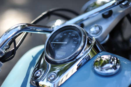 Motorcycle detail with gasoline tank and speedometer. Chrome motorcycle details closeupの写真素材