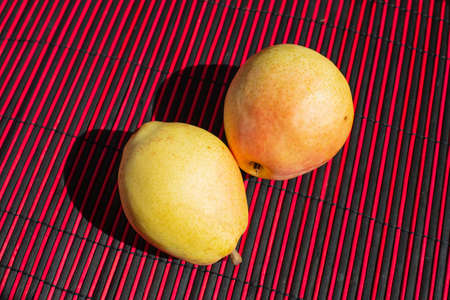 Fresh bio pears on the table. close up.の写真素材