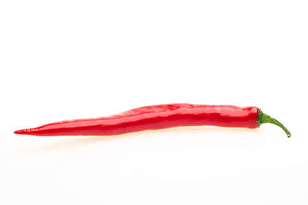 red hot chili pepper isolated on a white backgroundの写真素材