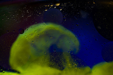Abstract colorful Background Oil in Water surface with Bubbles. macro shot close-up.