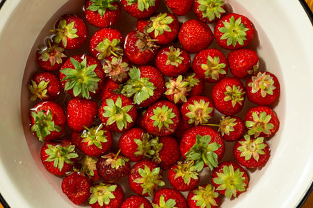 Fresh Strawberries In A Bowl With Water.の写真素材
