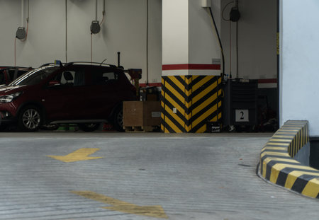 Quang Ngai, Vietnam - June 16, 2023: A corner of the garage at Vincom Quang Ngai shopping center in the afternoon.のeditorial素材