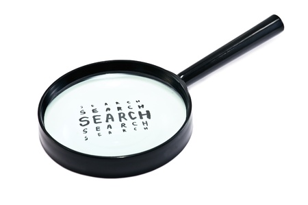 glass magnifier isolated on whiteの写真素材