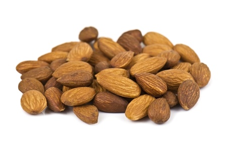 heap of almond on whiteの写真素材