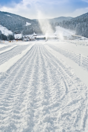 snowcat trail in the snowの写真素材