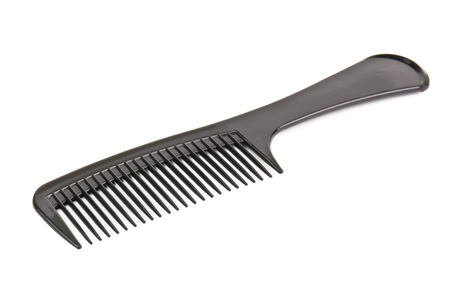 black hair comb on whiteの写真素材