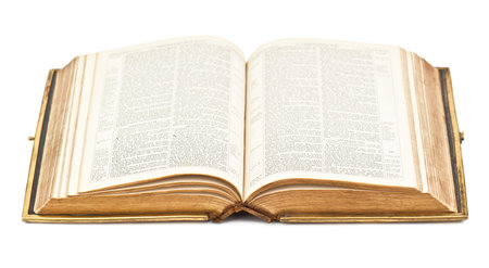old open Bible on white