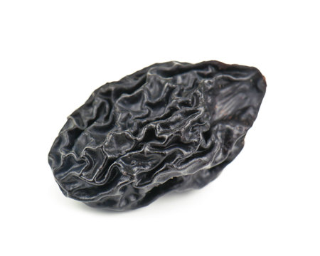 dried prune on white backgroundの写真素材