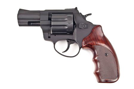 black revolver on white background