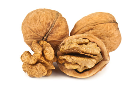 heap of walnut on white background