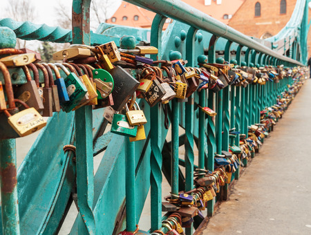 rusty love padlocks as a married tradition in wroclawの写真素材