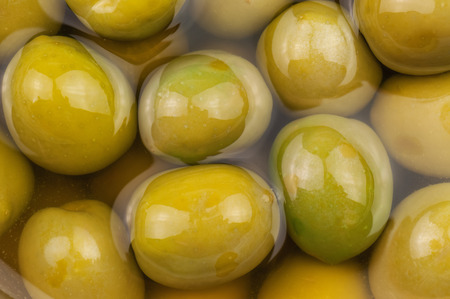 delicious marinated olives as a backgroundの写真素材