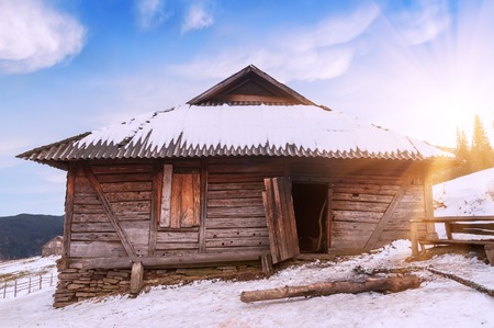 wooden abandoned cabin (chalet) in the mountainの写真素材