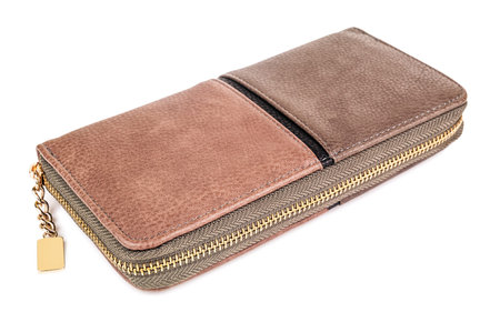 brown purse closed with zipper on white background