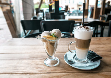 delicious ice cream and late coffee on the table