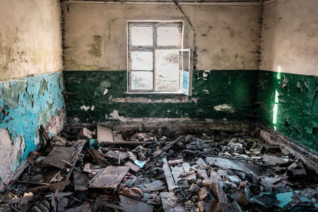 different garbage in abandoned ruined roomの写真素材