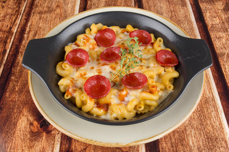 Delicious pasta on the black plateの写真素材