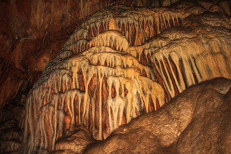 View of the Stalactites and stalagmites in Dim Caves.の写真素材