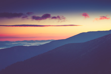 Beautiful foggy morning in the mountains.の写真素材