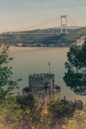 View of Rumelihisar is a fortress located in the Istanbul, Turkey on the hill at the European side of the Bosphorus. Old photo style.の写真素材