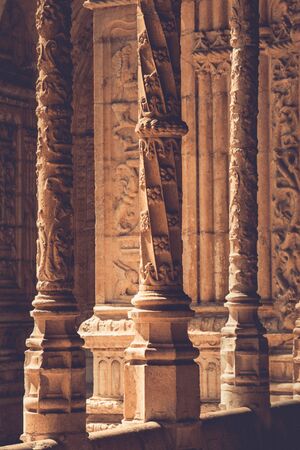 Beautiful reticulated vaulting and columns of Hieronymites Monastery. Manueline architecture style. Famous Lisbon landmark in Belem district. Portugal. Vintage effect.の写真素材