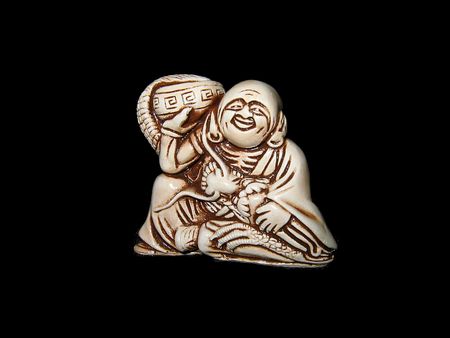 Netsuke. Mascot. Antiquarian figure. Amulet.の写真素材